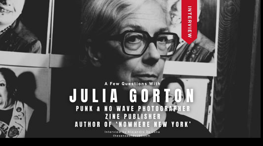 Black and white portrait of Julia Gorton in glasses, with the interview title 'A Few Questions With Julia Gorton' in white type
